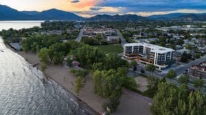 The Shore Kelowna aerial view with Gyro beach and Okanagan lake in foreground, highlighting Kelowna resorts and Kelowna resort alternatives
