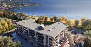 Birds eye view of one of Kelowna's new flexible-stay hotels, The Shore Kelowna, with Okanagan lake in the background