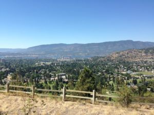 view of the Okanagan valley from hiking trails in Kelowna, an activity that's easily accessible from The Shore, a cabin rental alternative