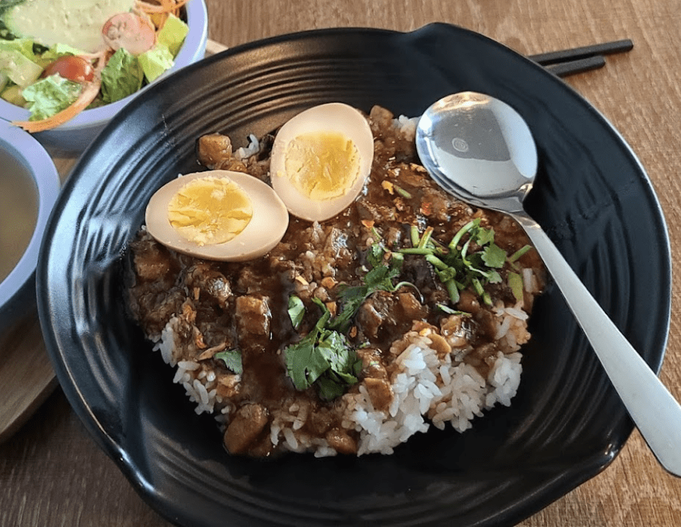 minced pork over rice with an egg at T One restaurant in Kelowna