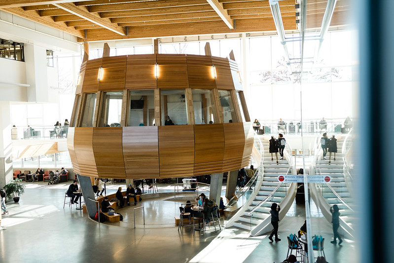 the okanagan college centre for learning hub with students studying and socializing in the foyer