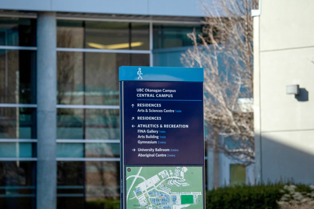 campus signs at UBCO, showing where to go to get to the residences, the athletics departments and other popular areas