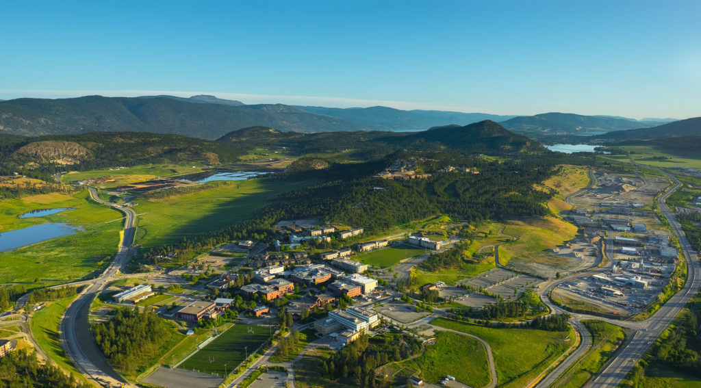 a birds-eye view of UBCO, surrounded by lakes and orchards in the city of Kelowna