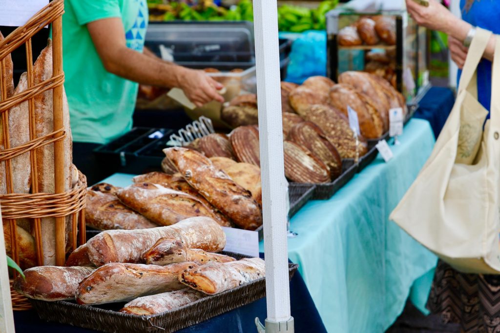 a closeup of pastries and breads at the Kelowna farmer's market