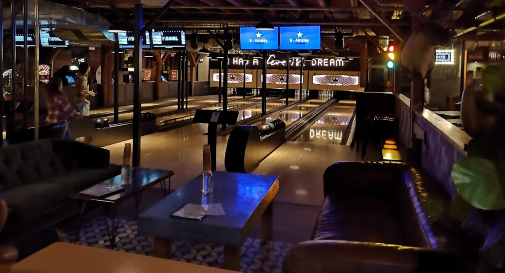 bna brewing eating area and bowling lanes in background
