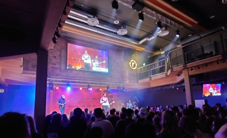 a concert and stage with musicians performing at Revelry, one of Kelowna's most unique restaurants