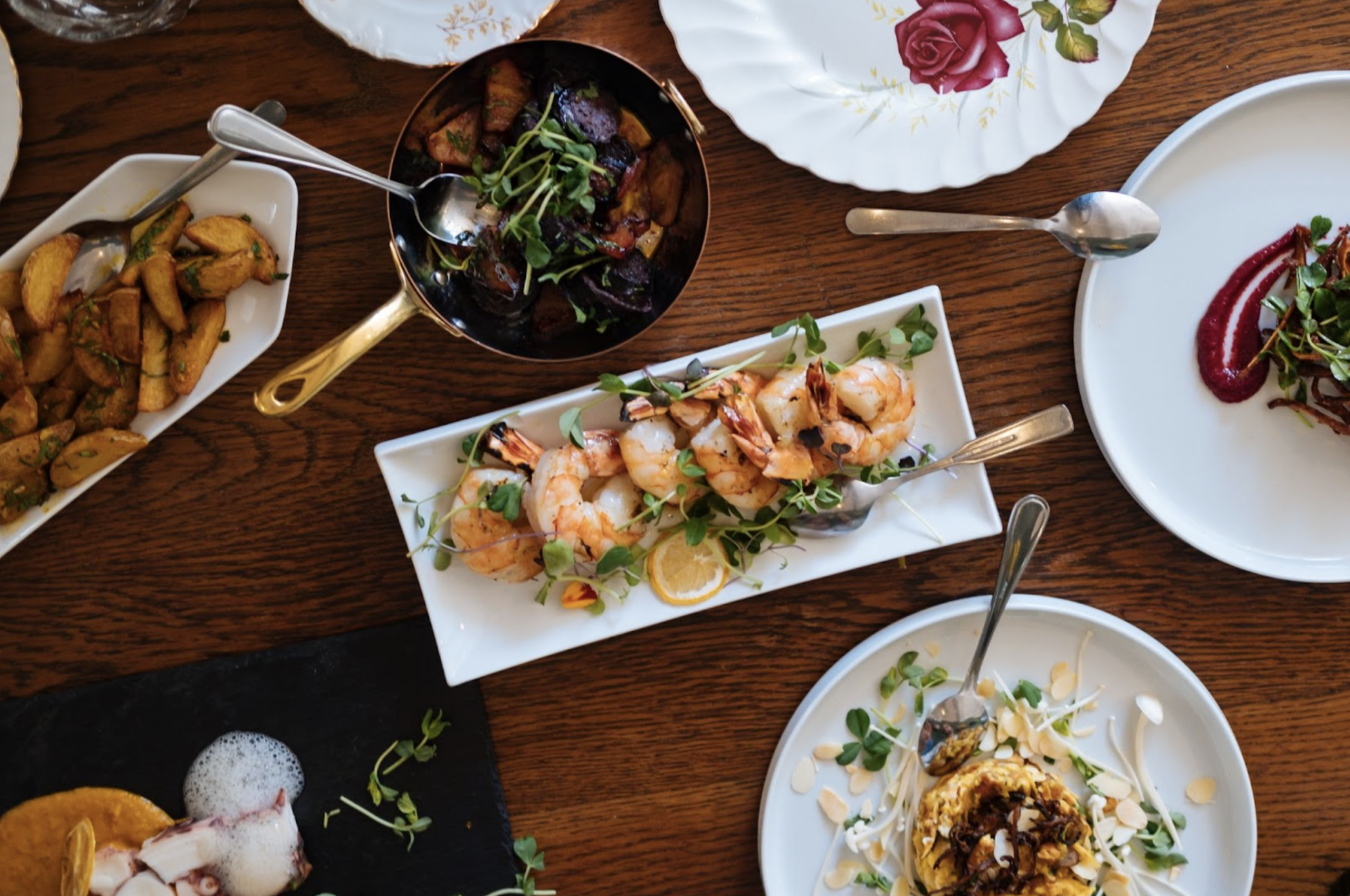 a top-down view of a table with various Vietnamese dishes at one of Kelowna's best Vietnamese restaurants