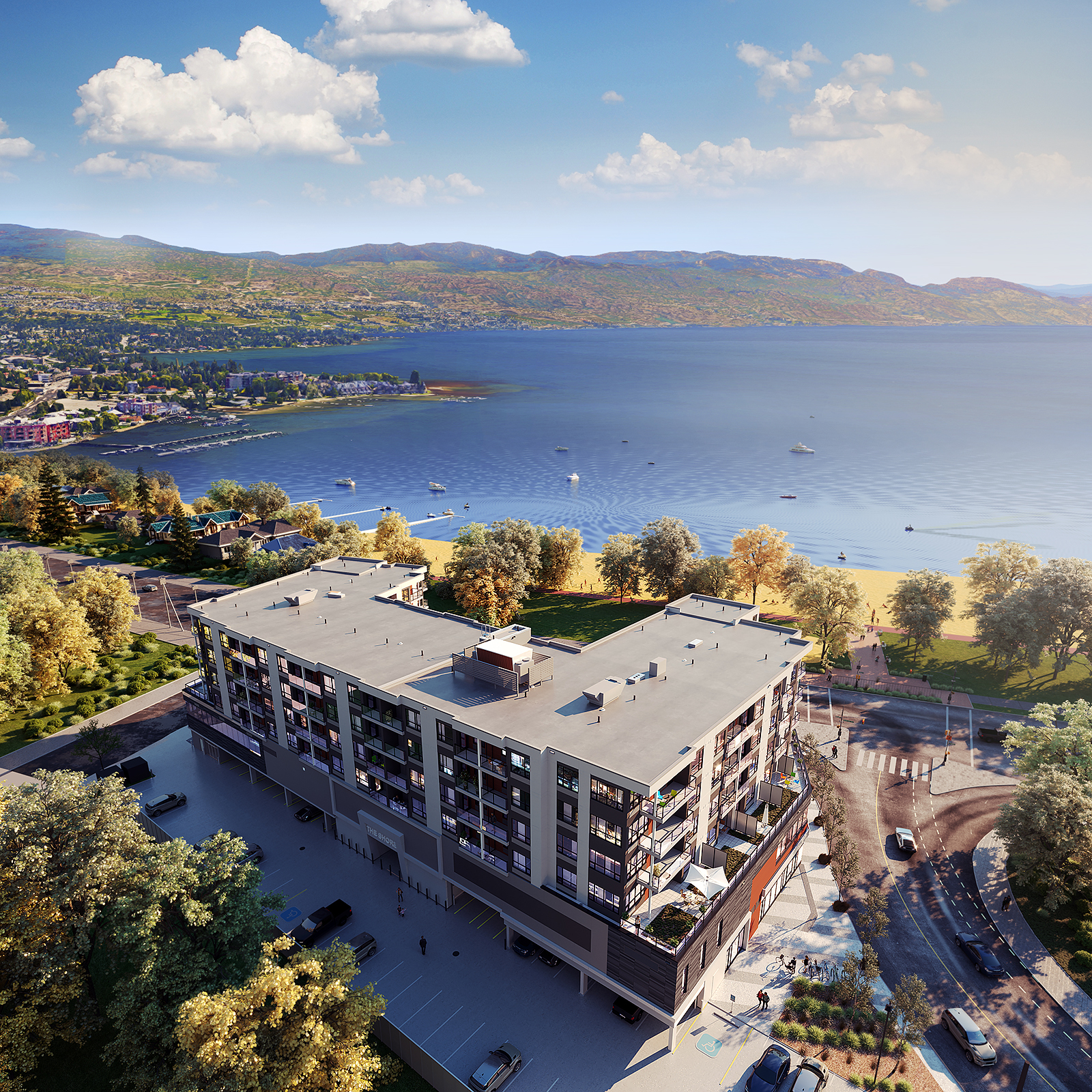 a birds-eye view of The Shore Kelowna, a modern apartment-hotel situated across the shore's of Okanagan lake